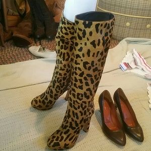 Prada knee high leopard boots